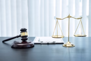 esas patent hukuk hizmetleri Judge gavel with Justice at law firm in background with legal case document contract, law and justice, attorney, lawsuit